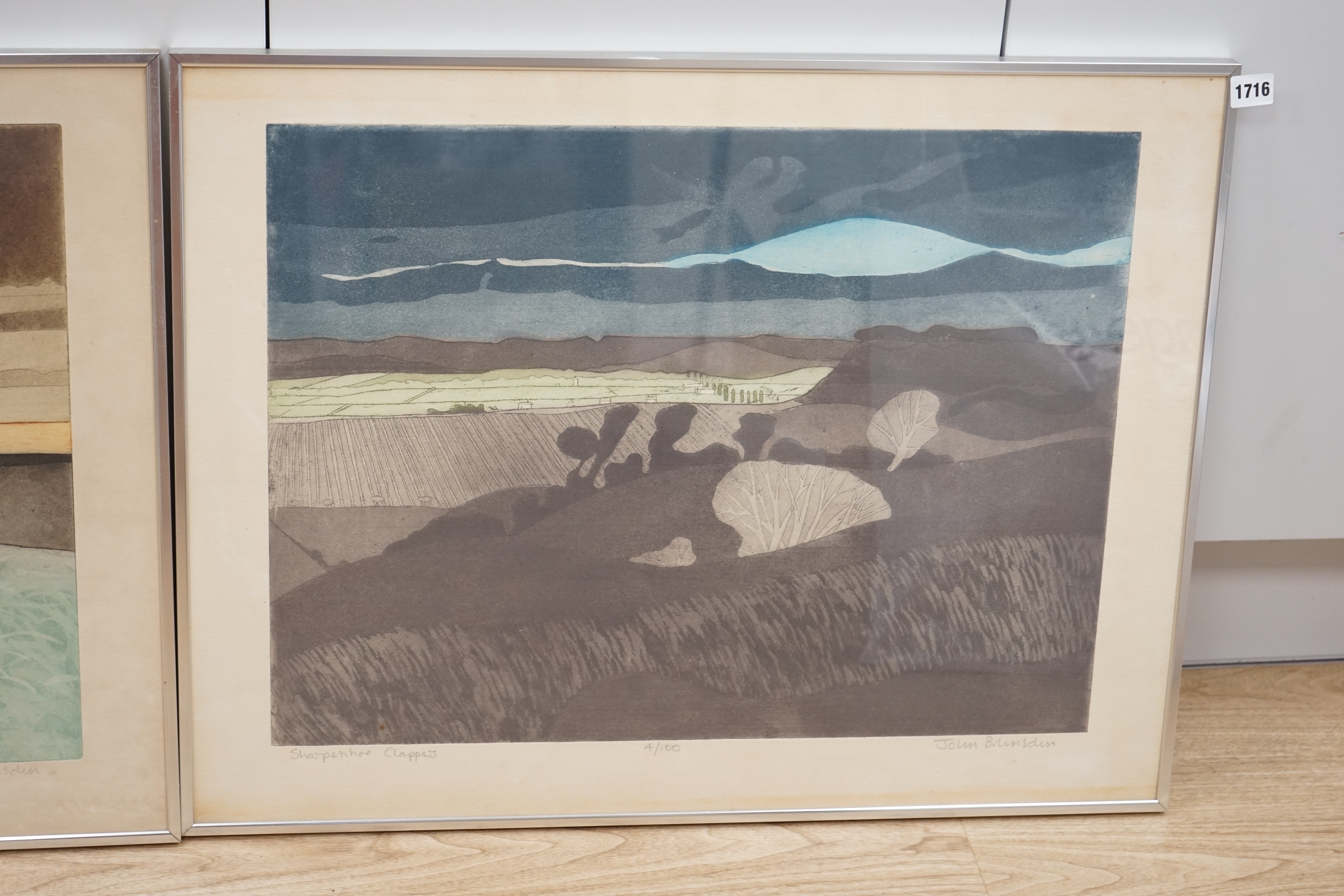 John Brunsdon (1933-2014), pair of etchings with aquatint, 'Evening light on the Gower' and one other, each limited edition, signed in pencil, 54 x 71cm. Condition - poor to fair, browning and discolouration to paper
